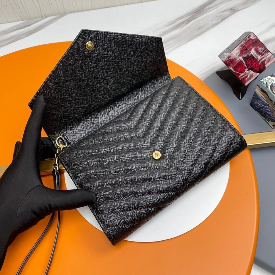 YSL CASSANDRE matelassé leather flap clutch