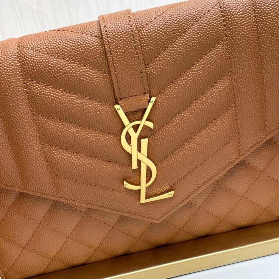 YSL CASSANDRE matelassé leather flap clutch