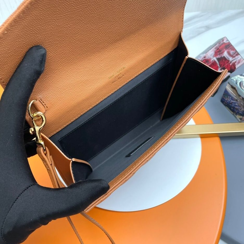 YSL CASSANDRE matelassé leather flap clutch