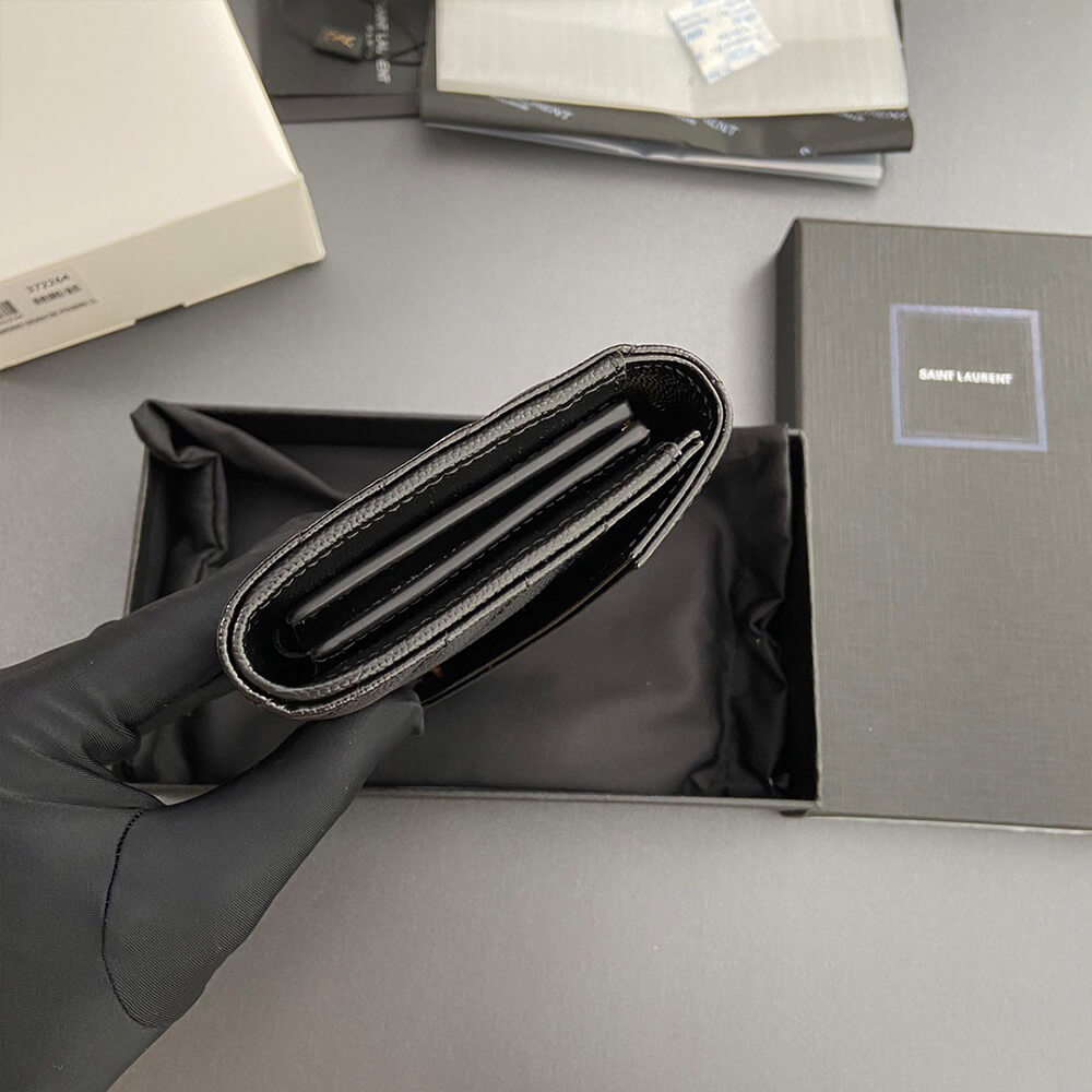 YSL CASSANDRE MATELASSÉ LARGE FLAP WALLET IN GRAIN DE POUDRE LEATHER