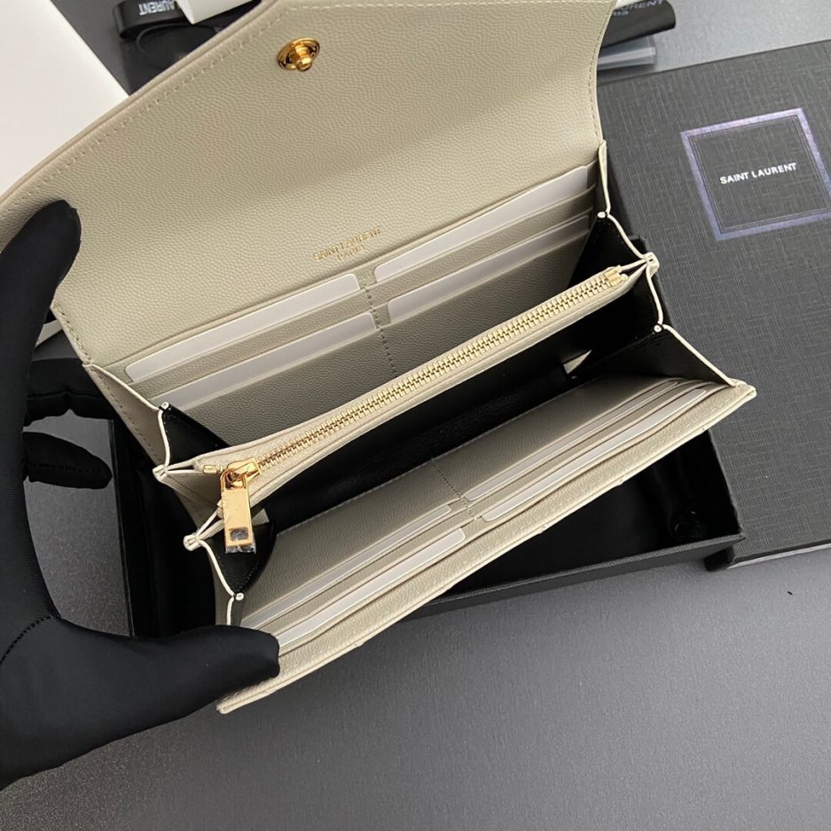 YSL CASSANDRE MATELASSÉ LARGE FLAP WALLET IN GRAIN DE POUDRE LEATHER